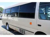 2016 Toyota Coaster Microbus EX Turbo Long, 29-seater Gold Van for sale, Japanese used car export - photo 18 of 62 | GULJI TRADERS
