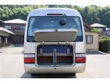 2016 Toyota Coaster Microbus EX Turbo Long, 29-seater Gold Van for sale, Japanese used car export - photo 28 of 62 | GULJI TRADERS
