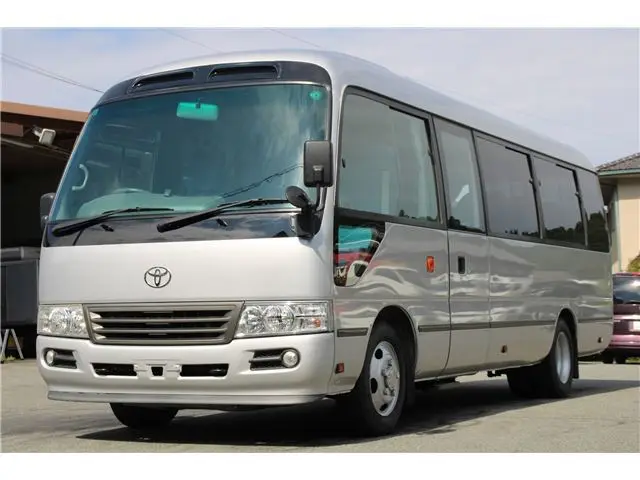 2016 Toyota Coaster Microbus GX Turbo Long, 29-seater - photo 1 2016 Toyota Coaster Microbus GX Turbo Long, 29-seater Silver Van for sale, Japanese used car export - photo 1 of 62 | GULJI TRADERS