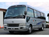 2016 Toyota Coaster GX Turbo Long 2 Sedan for sale, Japanese used car export - photo 1 of 9 | GULJI TRADERS