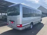 2017 Toyota Coaster GX28 Automatic Door Auto Step Navi Silver Van for sale, Japanese used car export - photo 2 of 50 | GULJI TRADERS