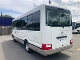 2017 Toyota Coaster GX Pearl Van for sale, Japanese used car export - photo 4 of 38 | GULJI TRADERS
