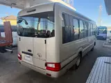 2017 Toyota Coaster 24-seater EX long rear double door AT automatic door RikuH leather seats Gold Van for sale, Japanese used car export - photo 5 of 38 | GULJI TRADERS