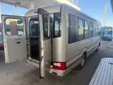 2017 Toyota Coaster 24-seater EX long rear double door AT automatic door RikuH leather seats Gold Van for sale, Japanese used car export - photo 9 of 38 | GULJI TRADERS