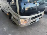 2017 Toyota Coaster 24-seater EX long rear double door AT automatic door RikuH leather seats Gold Van for sale, Japanese used car export - photo 26 of 38 | GULJI TRADERS