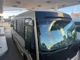 2017 Toyota Coaster 24-seater EX long rear double door AT automatic door RikuH leather seats Gold Van for sale, Japanese used car export - photo 28 of 38 | GULJI TRADERS