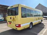 2017 Toyota Coaster Children's bus long 3+49/1.5 seater Yellow Van for sale, Japanese used car export - photo 2 of 57 | GULJI TRADERS