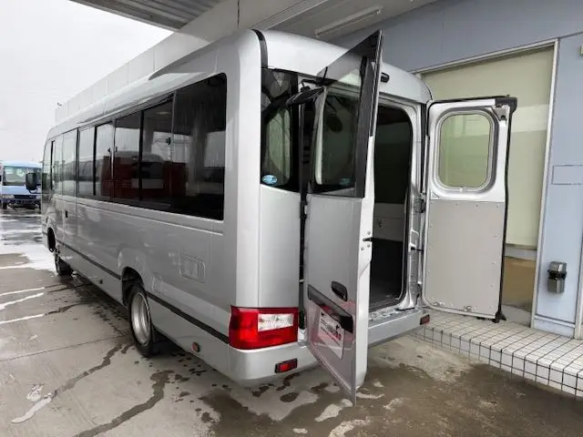 2017 Toyota Coaster 24-seater GX Long rear double doors 5MT automatic doors reclining seats Silver Van for sale, Japanese used car export - photo 1 of 37 | GULJI TRADERS
