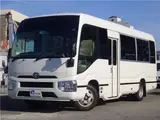 2017 Toyota Coaster LX Microbus, 29-seater, automatic doors, 2-number plate. White Van for sale, Japanese used car export - photo 1 of 76 | GULJI TRADERS