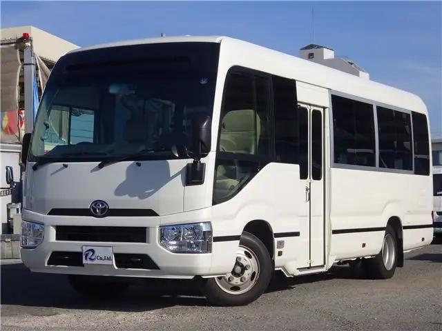 2017 Toyota Coaster LX Microbus, 29-seater, automatic doors, 2-number plate. White Van for sale, Japanese used car export - photo 1 of 76 | GULJI TRADERS