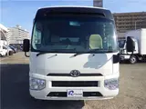 2017 Toyota Coaster LX Microbus, 29-seater, automatic doors, 2-number plate. White Van for sale, Japanese used car export - photo 4 of 76 | GULJI TRADERS