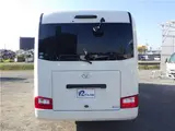 2017 Toyota Coaster LX Microbus, 29-seater, automatic doors, 2-number plate. White Van for sale, Japanese used car export - photo 5 of 76 | GULJI TRADERS