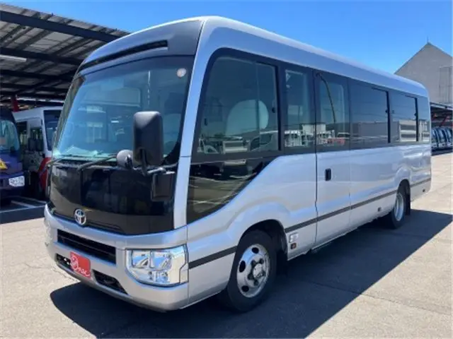2017 Toyota Coaster GX28-passenger automatic door, auto step navigation Silver Van for sale, Japanese used car export - photo 1 of 59 | GULJI TRADERS