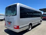 2017 Toyota Coaster GX28-passenger automatic door, auto step navigation Silver Van for sale, Japanese used car export - photo 2 of 59 | GULJI TRADERS
