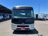 2017 Toyota Coaster GX28-passenger automatic door, auto step navigation Silver Van for sale, Japanese used car export - photo 4 of 59 | GULJI TRADERS