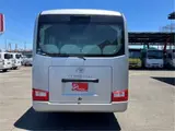 2017 Toyota Coaster GX28-passenger automatic door, auto step navigation Silver Van for sale, Japanese used car export - photo 5 of 59 | GULJI TRADERS