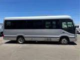 2017 Toyota Coaster GX28-passenger automatic door, auto step navigation Silver Van for sale, Japanese used car export - photo 7 of 59 | GULJI TRADERS