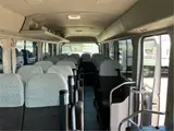 2017 Toyota Coaster GX28-passenger automatic door, auto step navigation Silver Van for sale, Japanese used car export - photo 39 of 59 | GULJI TRADERS
