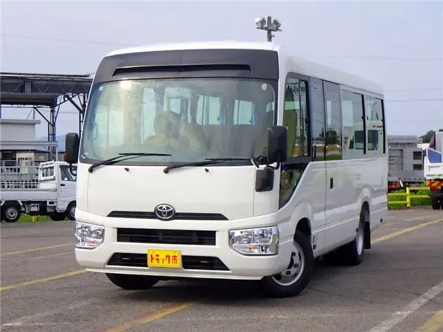 2017 Toyota Coaster Microbus LX 25-seater Short wheelbase Automatic swing door 5MT White Color changed Van for sale, Japanese used car export - photo 1 of 51 | GULJI TRADERS