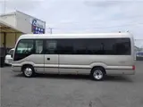 2017 Toyota Coaster EX Microbus, 28-seater, automatic doors, automatic transmission, navigation system, backup camera Brown Van for sale, Japanese used car export - photo 3 of 51 | GULJI TRADERS