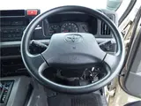 2017 Toyota Coaster EX Microbus, 28-seater, automatic doors, automatic transmission, navigation system, backup camera Brown Van for sale, Japanese used car export - photo 20 of 51 | GULJI TRADERS
