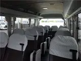 2017 Toyota Coaster EX Microbus, 28-seater, automatic doors, automatic transmission, navigation system, backup camera Brown Van for sale, Japanese used car export - photo 26 of 51 | GULJI TRADERS