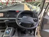 2017 Toyota Coaster GX28-passenger automatic door, auto step navigation White Van for sale, Japanese used car export - photo 3 of 60 | GULJI TRADERS