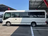 2017 Toyota Coaster GX28-passenger automatic door, auto step navigation White Van for sale, Japanese used car export - photo 6 of 60 | GULJI TRADERS