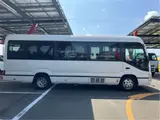 2017 Toyota Coaster GX28-passenger automatic door, auto step navigation White Van for sale, Japanese used car export - photo 7 of 60 | GULJI TRADERS