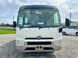 2017 Toyota Coaster LX Turbo 29-seater White Van for sale, Japanese used car export - photo 2 of 31 | GULJI TRADERS