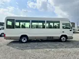 2017 Toyota Coaster LX Turbo 29-seater White Van for sale, Japanese used car export - photo 4 of 31 | GULJI TRADERS
