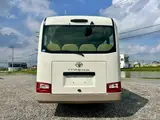 2017 Toyota Coaster LX Turbo 29-seater White Van for sale, Japanese used car export - photo 6 of 31 | GULJI TRADERS