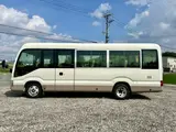2017 Toyota Coaster LX Turbo 29-seater White Van for sale, Japanese used car export - photo 8 of 31 | GULJI TRADERS