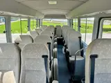 2017 Toyota Coaster LX Turbo 29-seater White Van for sale, Japanese used car export - photo 17 of 31 | GULJI TRADERS