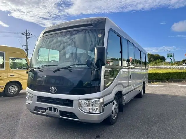 2017 Toyota Coaster GX Turbo (29 seats) Silver Van for sale, Japanese used car export - photo 1 of 32 | GULJI TRADERS
