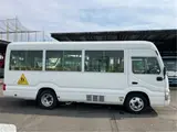 2017 Toyota Coaster Toddler bus 3+39/1.5 passenger capacity White Van for sale, Japanese used car export - photo 7 of 56 | GULJI TRADERS