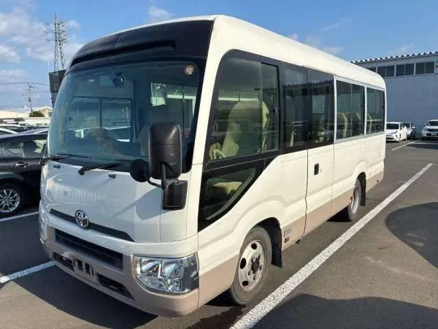2017 Toyota Coaster LX White Van for sale, Japanese used car export - photo 1 of 10 | GULJI TRADERS