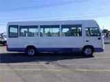 2018 Toyota Coaster Microbus LX 29-passenger long automatic door reclining White Van for sale, Japanese used car export - photo 4 of 51 | GULJI TRADERS
