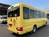 2018 Toyota Coaster Toddler bus, long type, 3+49/1.5 passenger capacity, automatic doors. Yellow Van for sale, Japanese used car export - photo 2 of 63 | GULJI TRADERS