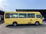 2018 Toyota Coaster Toddler bus, long type, 3+49/1.5 passenger capacity, automatic doors. Yellow Van for sale, Japanese used car export - photo 7 of 63 | GULJI TRADERS