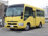 2018 Toyota Coaster 25-seater minibus, automatic transmission, automatic doors, collision mitigation braking system. Yellow Color changed Van for sale, Japanese used car export - photo 1 of 39 | GULJI TRADERS
