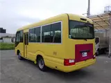 2018 Toyota Coaster 25-seater minibus, automatic transmission, automatic doors, collision mitigation braking system. Yellow Color changed Van for sale, Japanese used car export - photo 2 of 39 | GULJI TRADERS