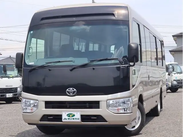2018 Toyota Coaster EX 29 people, automatic doors Brown Van for sale, Japanese used car export - photo 1 of 40 | GULJI TRADERS