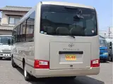 2018 Toyota Coaster EX 29 people, automatic doors Brown Van for sale, Japanese used car export - photo 2 of 40 | GULJI TRADERS