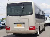 2018 Toyota Coaster EX 29 people, automatic doors Brown Van for sale, Japanese used car export - photo 5 of 40 | GULJI TRADERS