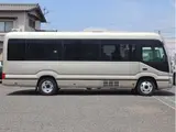 2018 Toyota Coaster EX 29 people, automatic doors Brown Van for sale, Japanese used car export - photo 8 of 40 | GULJI TRADERS