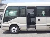 2018 Toyota Coaster EX 29 people, automatic doors Brown Van for sale, Japanese used car export - photo 10 of 40 | GULJI TRADERS