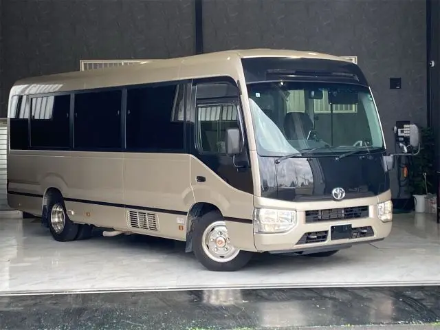 2018 Toyota Coaster EX / Rearview monitor / Automatic center door / 29-seater / ETC Gold Van for sale, Japanese used car export - photo 1 of 33 | GULJI TRADERS