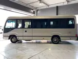 2018 Toyota Coaster EX / Rearview monitor / Automatic center door / 29-seater / ETC Gold Van for sale, Japanese used car export - photo 4 of 33 | GULJI TRADERS