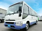 2018 Toyota Coaster Microbus White Color changed Van for sale, Japanese used car export - photo 2 of 60 | GULJI TRADERS